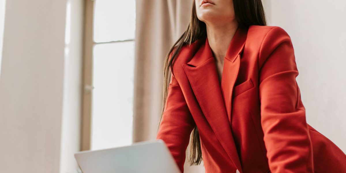 A woman confidently working towards her objectives, reflecting conviction in one's ideas.