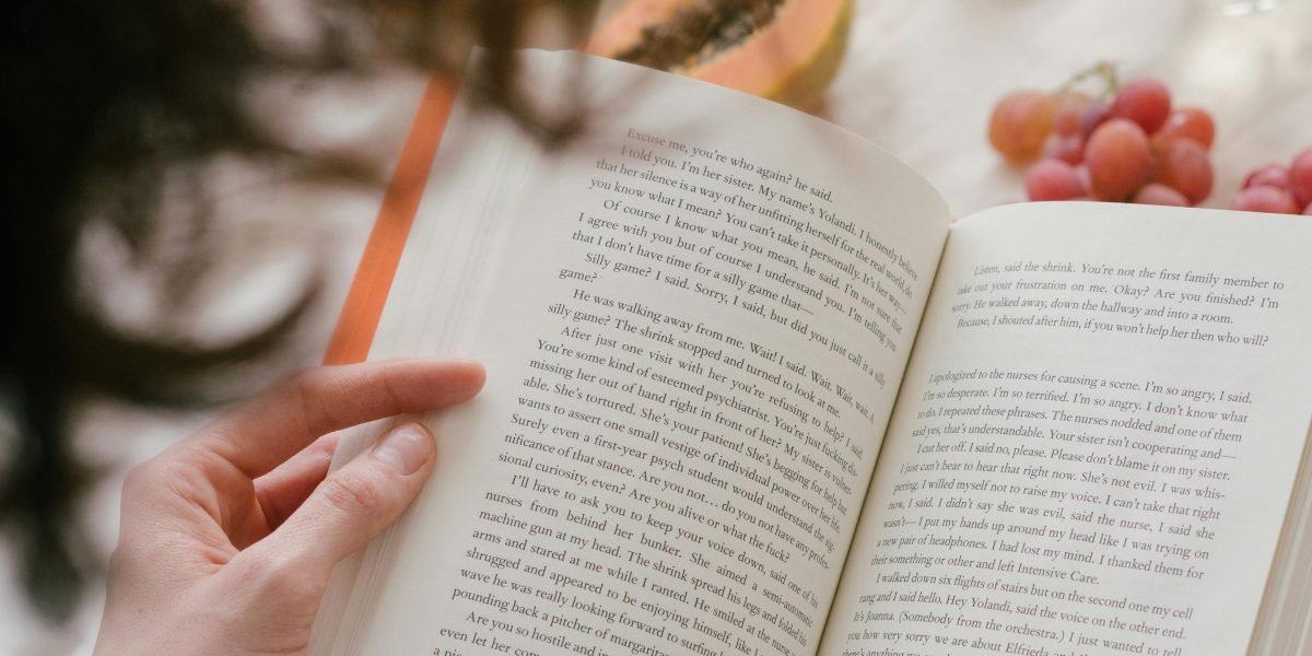 A person immersed in a romance novel, experiencing heartfelt emotions and connection.